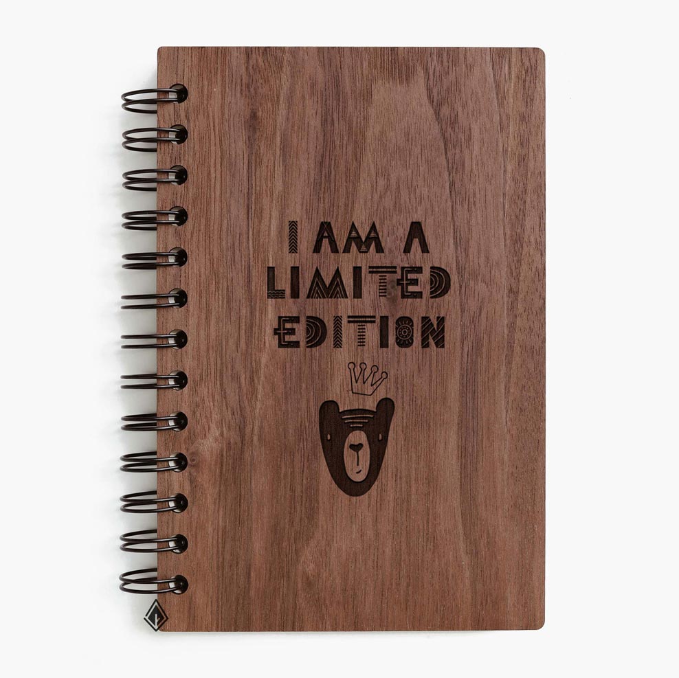 I'm a limited edition walnut wooden notebook